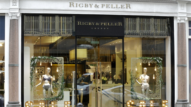 June Kenton the former owner of a luxury British bra maker that supplied lingerie to Queen Elizabeth II said the company lost its royal warrant. (AP Photo/Alastair Grant)