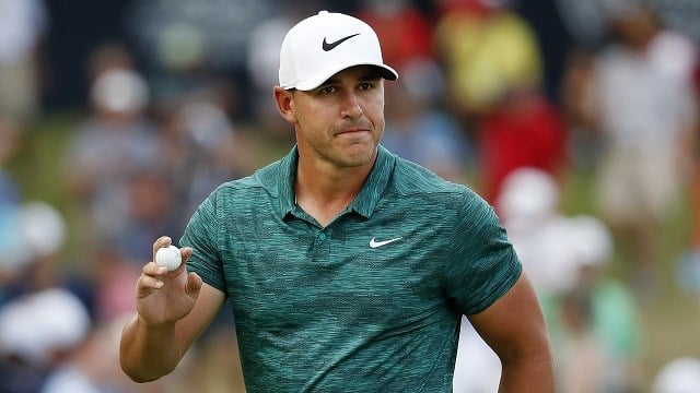 Koepka holds off Woods to win PGA Championship